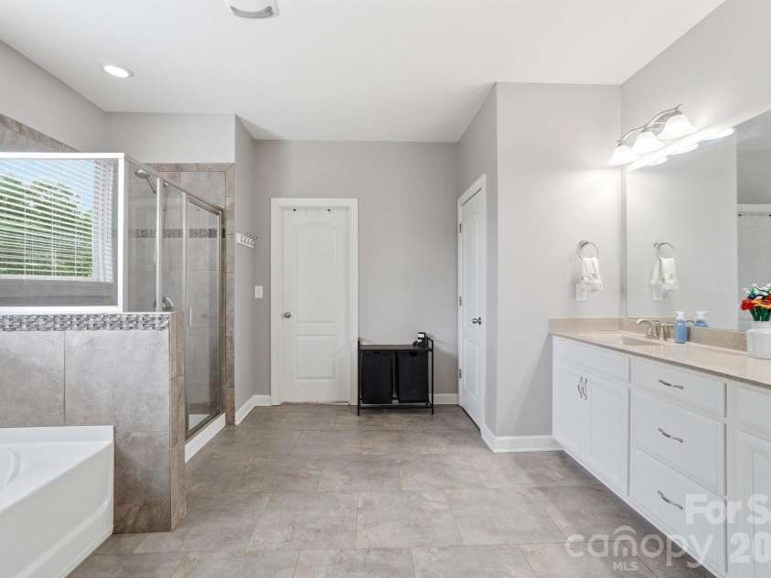 1385 Cilantro Court, Tega Cay, SC 29708.  MLS# CAR4391171, YatesRealty ID 29526. Primary Bathroom