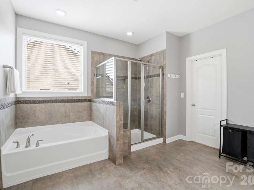 1385 Cilantro Court, Tega Cay, SC 29708.  MLS# CAR4391171, YatesRealty ID 29526. Primary Bathroom