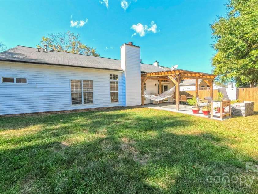 3693 Stonefield Street, Concord, NC 28027.  MLS# CAR4312117, YatesRealty ID 2953. Back of Home 