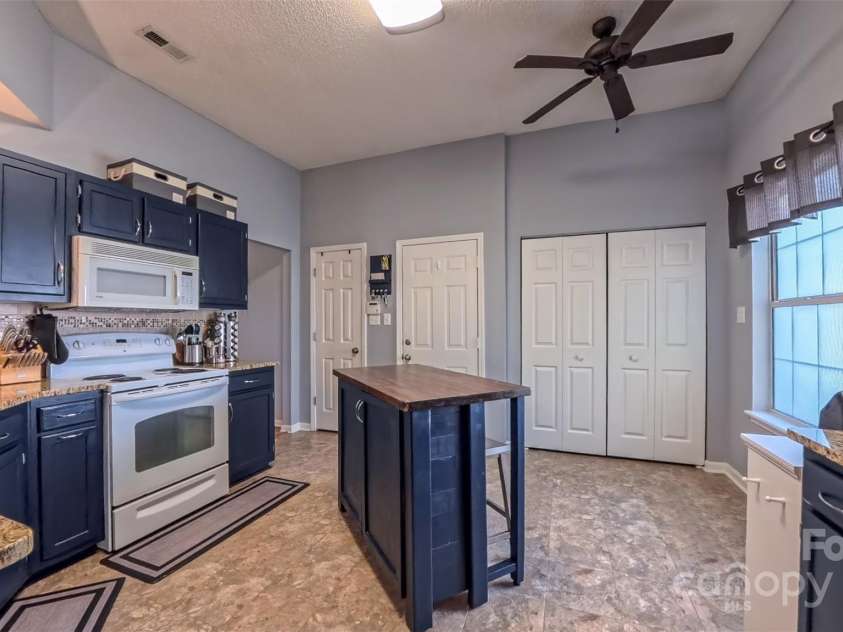 3693 Stonefield Street, Concord, NC 28027.  MLS# CAR4312117, YatesRealty ID 2953. Kitchen 