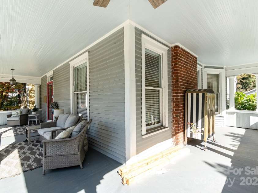 70 Spring Street, Concord, NC 28025.  MLS# CAR4195960, YatesRealty ID 2953. Wrap around front porch