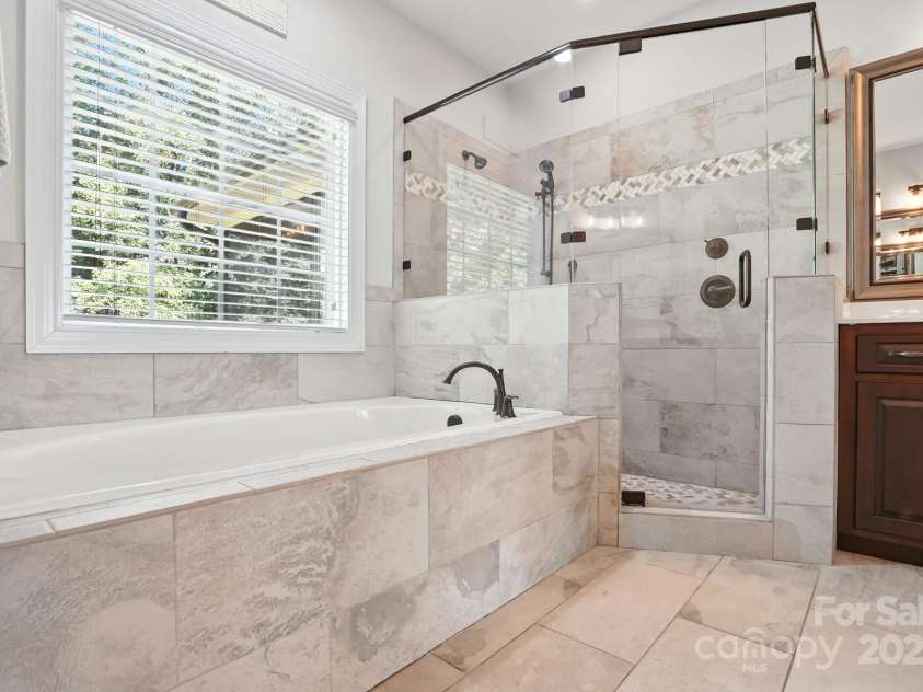 7006 Nesbit Road, Waxhaw, NC 28173.  MLS# CAR4297679, YatesRealty ID 29535. Primary Bath