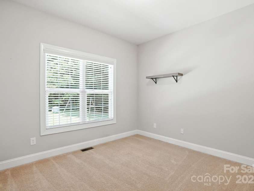 7006 Nesbit Road, Waxhaw, NC 28173.  MLS# CAR4297679, YatesRealty ID 29535. Secondary Bedroom - Main Level