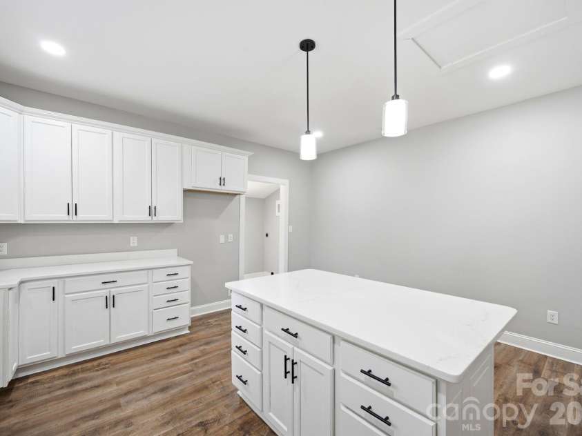314 Weldon Street, Gastonia, NC 28052.  MLS# CAR4392699, YatesRealty ID 29546. Extra Seating & Storage at the Kitchen Island