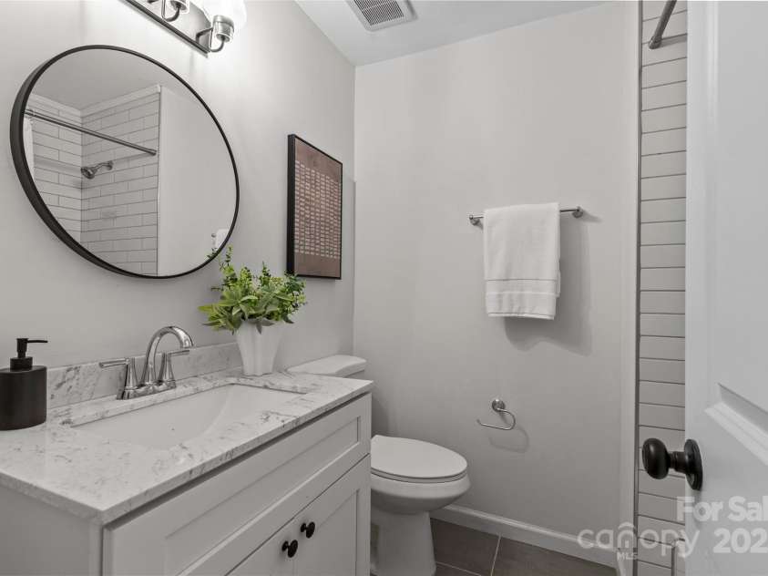 5329 Valley Forge Road, Charlotte, NC 28210.  MLS# CAR4269436, YatesRealty ID 29548. Updated Vanity & Lighting