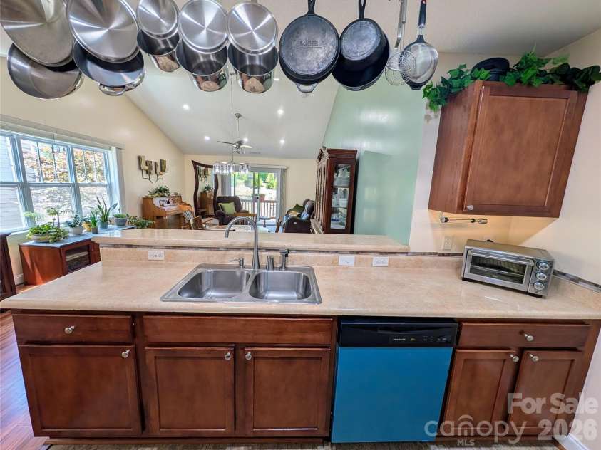 65 Foxden Drive, Fletcher, NC 28732.  MLS# CAR4389530, YatesRealty ID 29552. Blue wrap on new stainless dishwasher