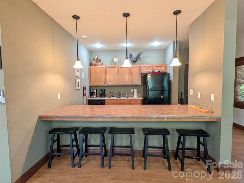 65 Foxden Drive, Fletcher, NC 28732.  MLS# CAR4389530, YatesRealty ID 29552. Club House Kitchen
