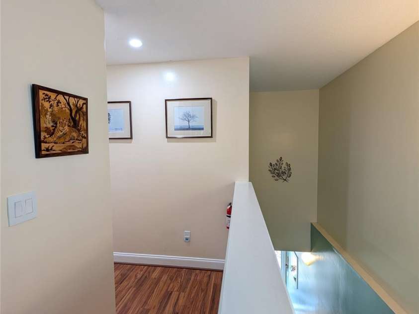 65 Foxden Drive, Fletcher, NC 28732.  MLS# CAR4389530, YatesRealty ID 29552. Hall to front bedrooms/bath/laundry