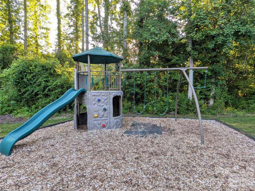 65 Foxden Drive, Fletcher, NC 28732.  MLS# CAR4389530, YatesRealty ID 29552. Playground by Pool