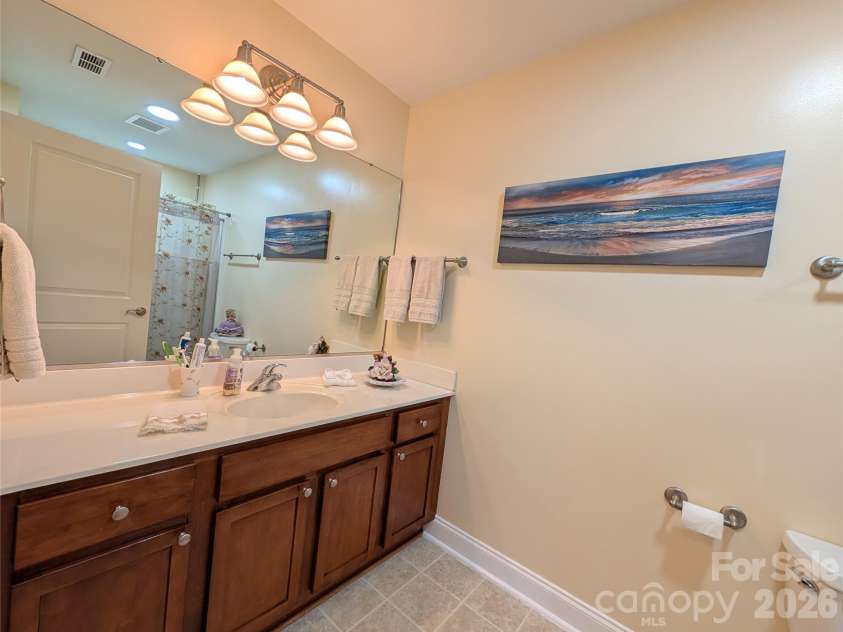 65 Foxden Drive, Fletcher, NC 28732.  MLS# CAR4389530, YatesRealty ID 29552. Primary bathroom