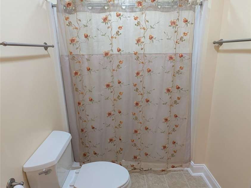 65 Foxden Drive, Fletcher, NC 28732.  MLS# CAR4389530, YatesRealty ID 29552. Primary walk-in shower