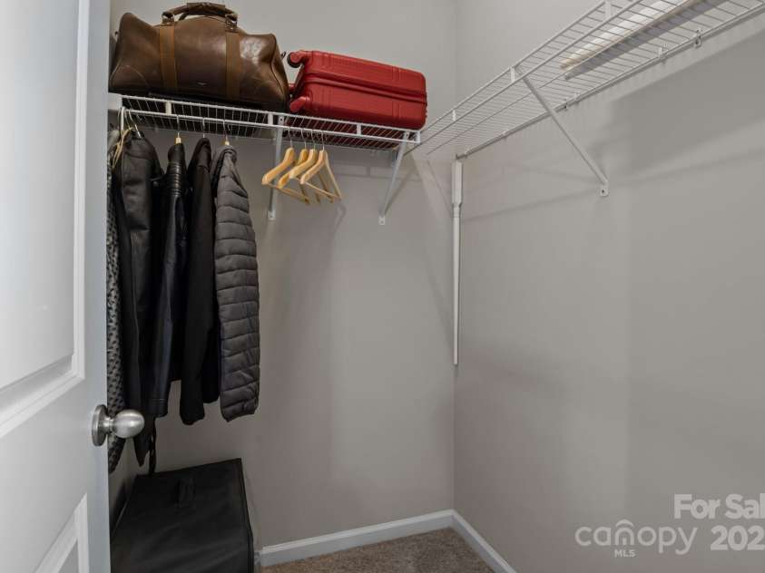 9426 Hightower Oak Street, Huntersville, NC 28078.  MLS# CAR4279151, YatesRealty ID 29552. Bedroom 3 walk-in closet