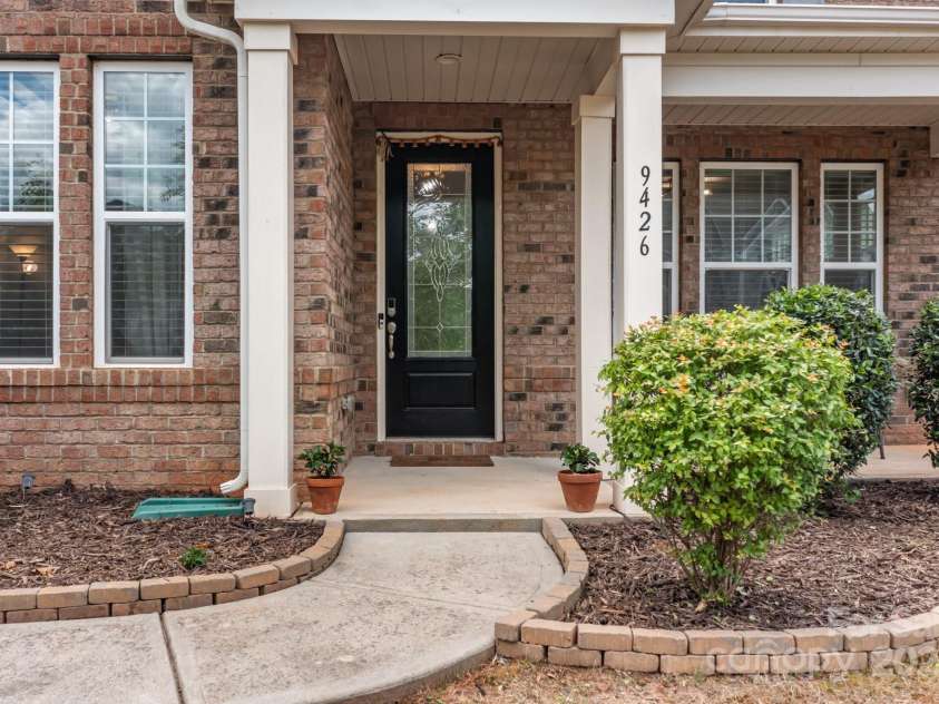 9426 Hightower Oak Street, Huntersville, NC 28078.  MLS# CAR4279151, YatesRealty ID 29552. Charming front porch