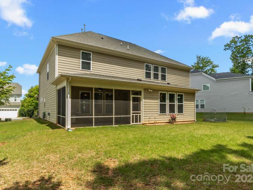 9426 Hightower Oak Street, Huntersville, NC 28078.  MLS# CAR4279151, YatesRealty ID 29552. Rear yard has space to play or host a cookout