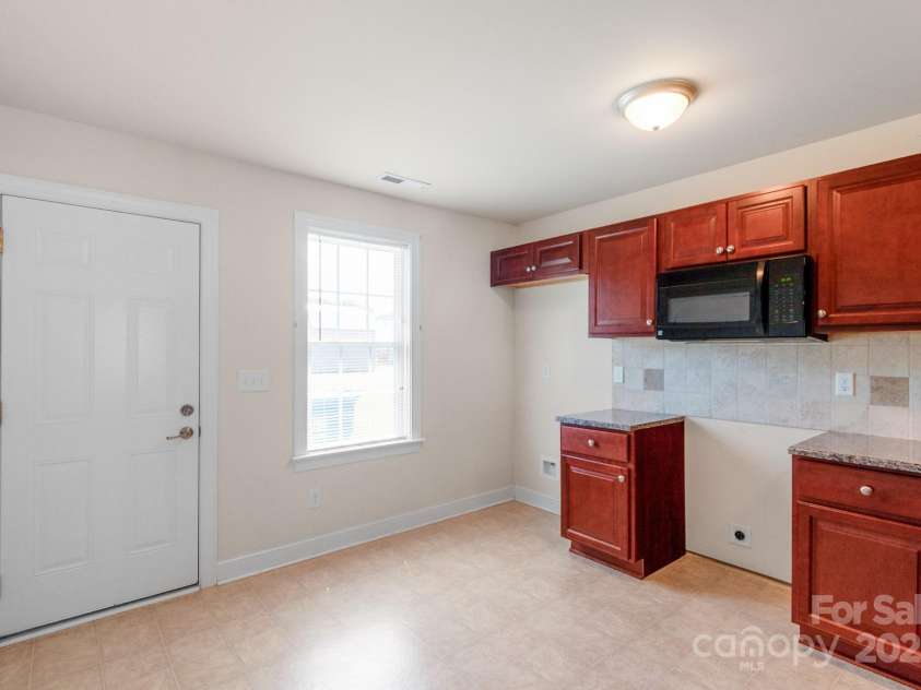 169 Abigail Lane, Locust, NC 28097.  MLS# CAR4281460, YatesRealty ID 29555. Kitchen