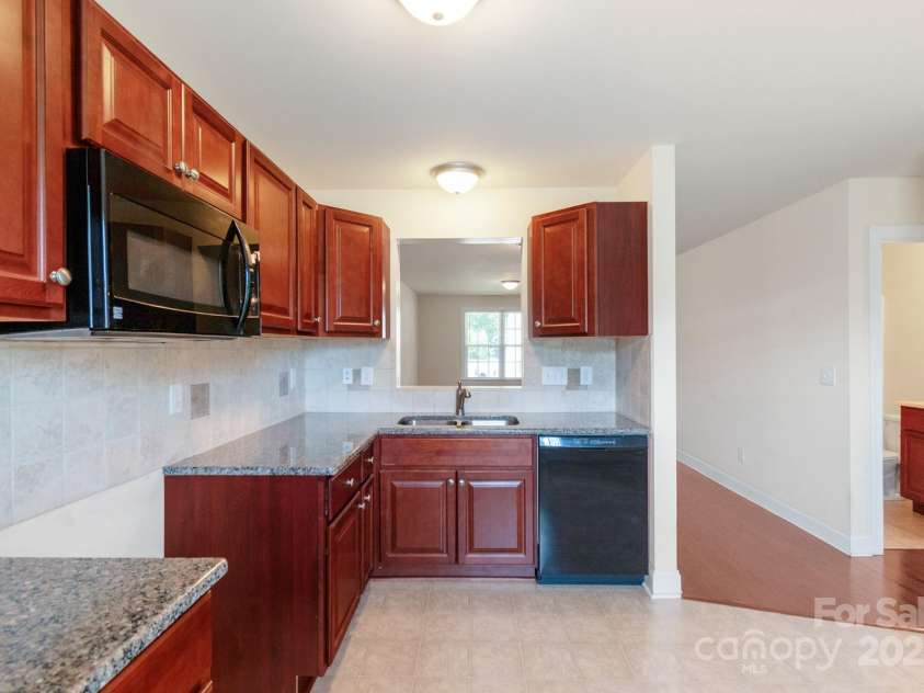 169 Abigail Lane, Locust, NC 28097.  MLS# CAR4281460, YatesRealty ID 29555. Kitchen