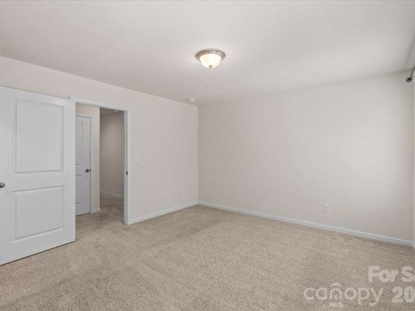6040 Artigas Drive, Fort Mill, SC 29707.  MLS# CAR4390680, YatesRealty ID 29555. Front right bdrm
