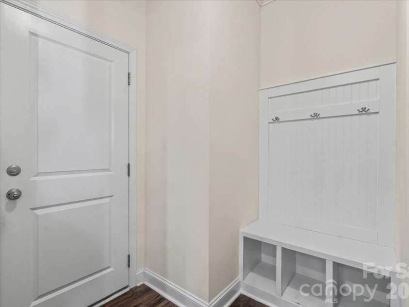 6040 Artigas Drive, Fort Mill, SC 29707.  MLS# CAR4390680, YatesRealty ID 29555. Garage door and drop zone