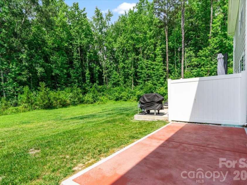6040 Artigas Drive, Fort Mill, SC 29707.  MLS# CAR4390680, YatesRealty ID 29555. Home back to woods.  This is your view