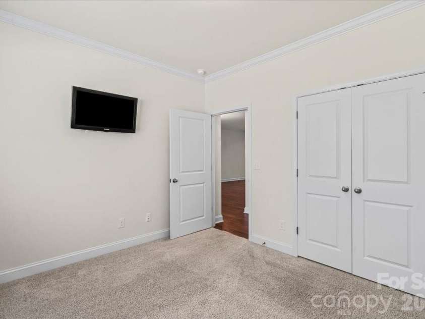 6040 Artigas Drive, Fort Mill, SC 29707.  MLS# CAR4390680, YatesRealty ID 29555. Main level bedroom