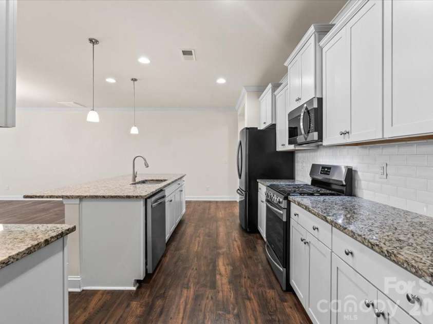 6040 Artigas Drive, Fort Mill, SC 29707.  MLS# CAR4390680, YatesRealty ID 29555. Such a functional kithen layout