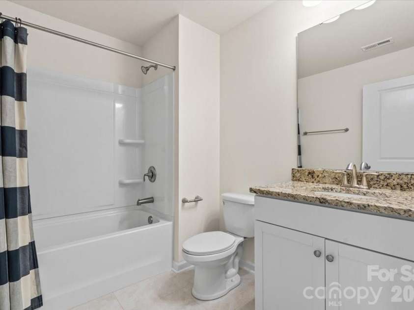 6040 Artigas Drive, Fort Mill, SC 29707.  MLS# CAR4390680, YatesRealty ID 29555. Upstairs hall bath