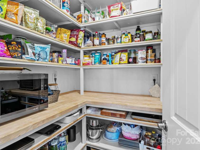 190 Susannah Street, Troutman, NC 28166.  MLS# CAR4283522, YatesRealty ID 29557. Walk in Pantry with butcher block counter