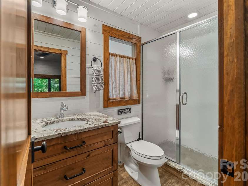 2087 Firestone Trail, Nebo, NC 28761.  MLS# CAR4390995, YatesRealty ID 29557. Bonus bathroom in garage suite