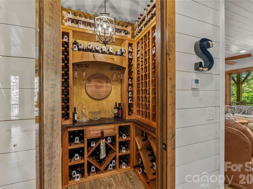 2087 Firestone Trail, Nebo, NC 28761.  MLS# CAR4390995, YatesRealty ID 29557. Climate controlled wine storage room