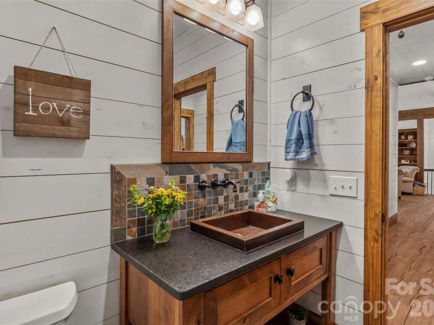 2087 Firestone Trail, Nebo, NC 28761.  MLS# CAR4390995, YatesRealty ID 29557. Full bathroom in mudroom/laundry area
