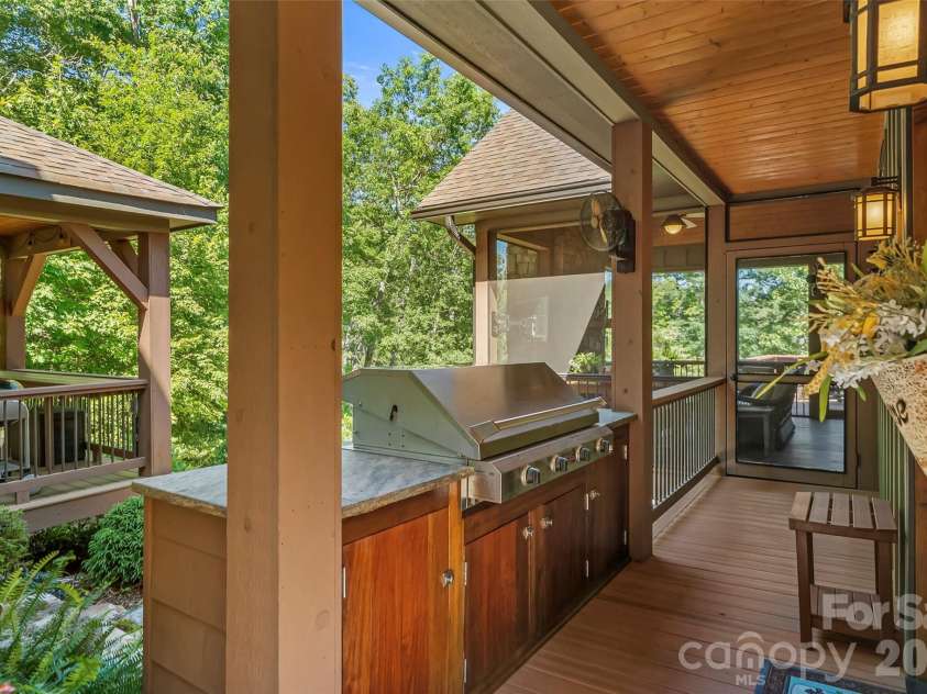 2087 Firestone Trail, Nebo, NC 28761.  MLS# CAR4390995, YatesRealty ID 29557. Grilling porch