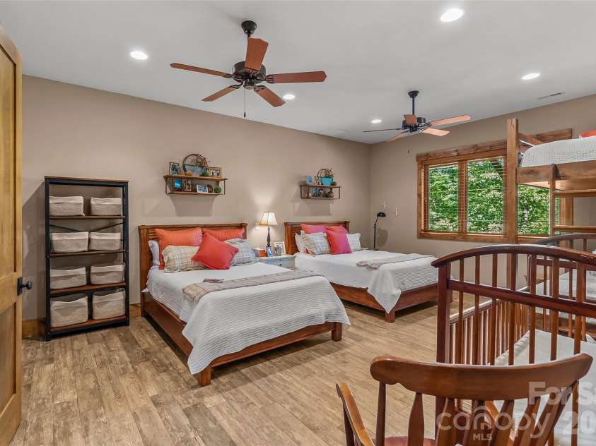 2087 Firestone Trail, Nebo, NC 28761.  MLS# CAR4390995, YatesRealty ID 29557. Lower level bedroom w/built in bunks and ensuite bath
