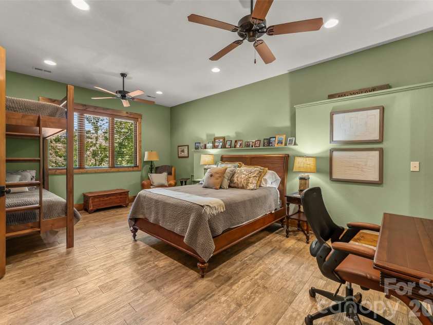 2087 Firestone Trail, Nebo, NC 28761.  MLS# CAR4390995, YatesRealty ID 29557. Lower level bedroom w/built in bunks and ensuite bath
