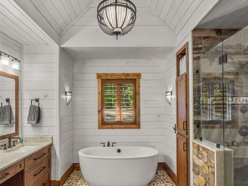 2087 Firestone Trail, Nebo, NC 28761.  MLS# CAR4390995, YatesRealty ID 29557. Primary ensuite bathroom