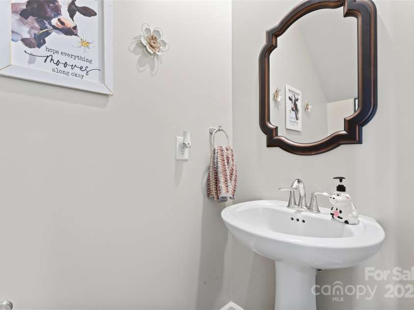 7742 Sea Turtle Way, Lancaster, SC 29720.  MLS# CAR4285392, YatesRealty ID 29562. Half Bathroom off from the foyer