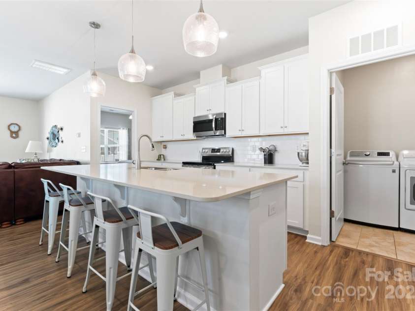 7742 Sea Turtle Way, Lancaster, SC 29720.  MLS# CAR4285392, YatesRealty ID 29562. Large Island comfortably sits 4