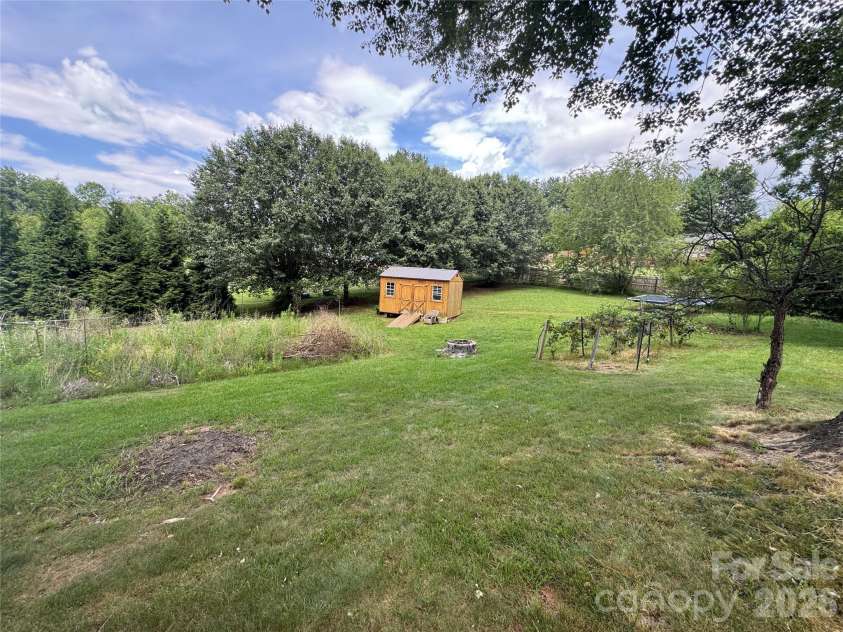 3 Odie Lane, Candler, NC 28715.  MLS# CAR4367725, YatesRealty ID 29563. Massive garden space.