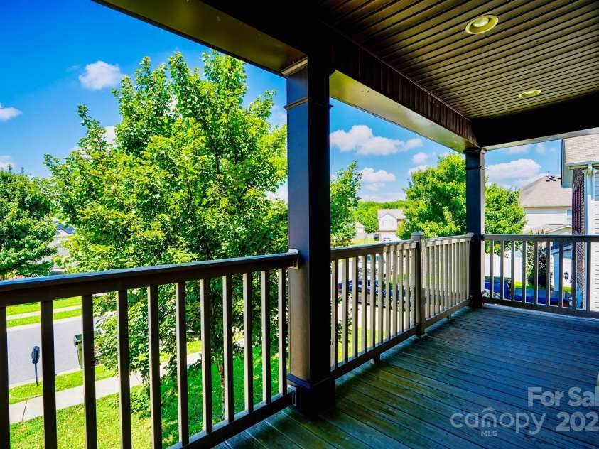 10916 Tower Oak Drive, Charlotte, NC 28269.  MLS# CAR4280677, YatesRealty ID 29565. Balcony upstairs