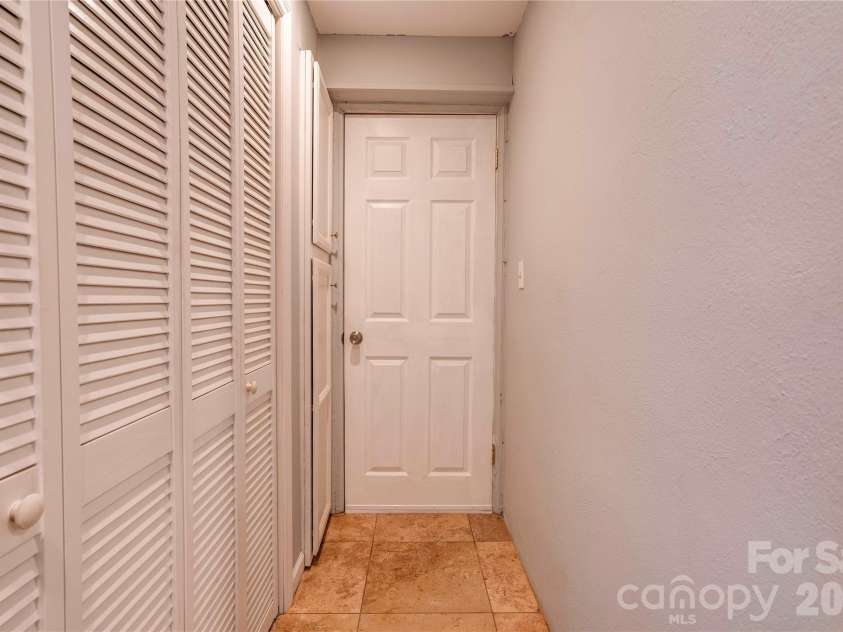 110 Greene Drive, Shelby, NC 28150.  MLS# CAR4389404, YatesRealty ID 29565. Basement Hallway
