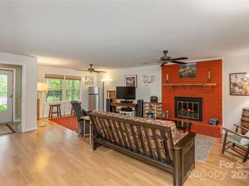 230 Foxwood Drive, Hendersonville, NC 28791.  MLS# CAR4255865, YatesRealty ID 29566. Family Room - Lower level