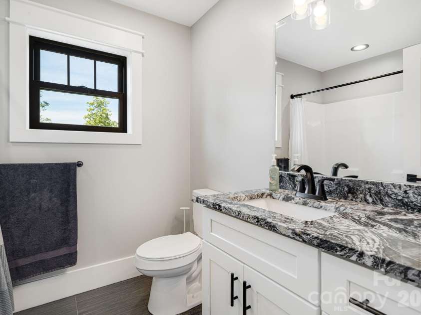163 Northview Drive, Hendersonville, NC 28791.  MLS# CAR4390968, YatesRealty ID 29570. 2nd floor bathroom