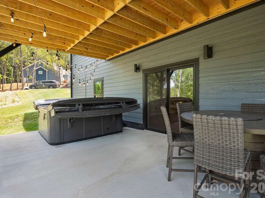 163 Northview Drive, Hendersonville, NC 28791.  MLS# CAR4390968, YatesRealty ID 29570. Lower patio