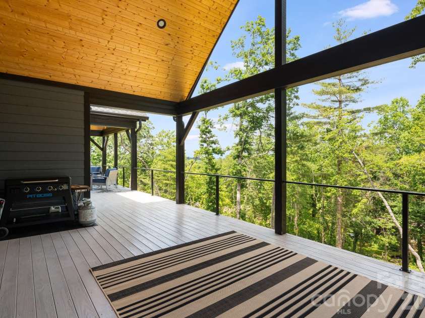 163 Northview Drive, Hendersonville, NC 28791.  MLS# CAR4390968, YatesRealty ID 29570. Main level deck