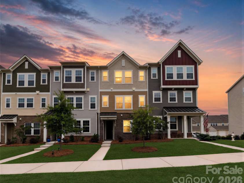 147 Morning Gap Parkway, Fort Mill, SC 29715.  MLS# CAR4389496, YatesRealty ID 29571. Lawn and skyline virtually enhanced