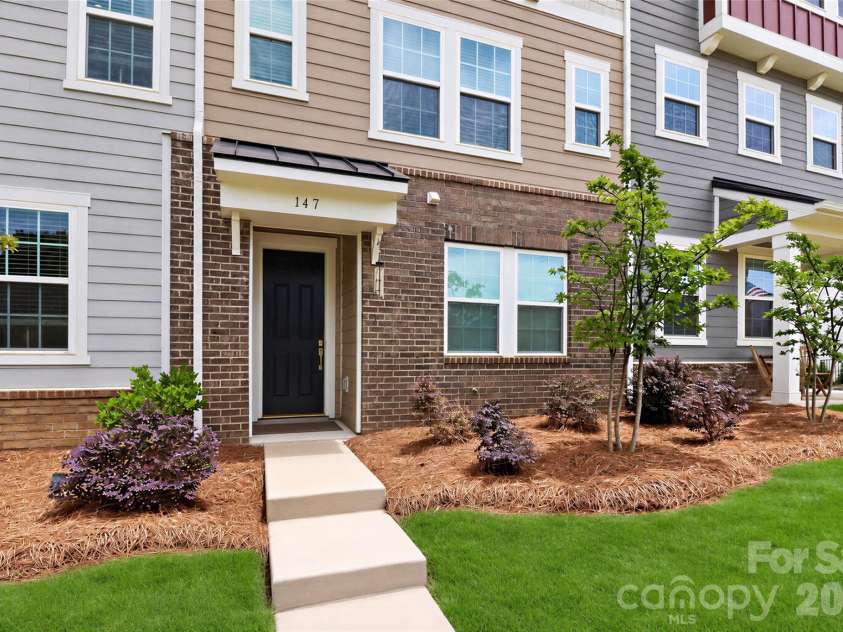 147 Morning Gap Parkway, Fort Mill, SC 29715.  MLS# CAR4389496, YatesRealty ID 29571. Lawn virtually enhanced