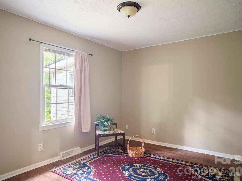 825 Gallimore Road, Flat Rock, NC 28731.  MLS# CAR4391388, YatesRealty ID 29572. 