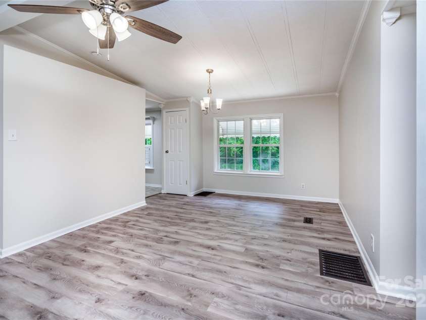 7050 Forney Hill Road, Denver, NC 28037.  MLS# CAR4243315, YatesRealty ID 29578. Dining Room open to Great Room with Vaulted Ceilings