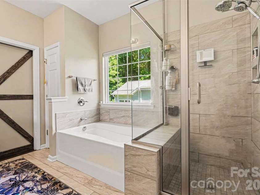 12301 Flatbush Drive, Huntersville, NC 28078.  MLS# CAR4382119, YatesRealty ID 29579. Luxury Ceramic Tile Primary Bath