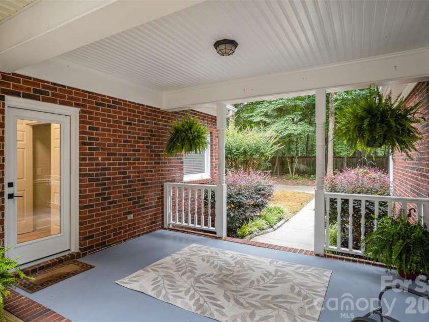 7408 Mockingbird Lane, Waxhaw, NC 28173.  MLS# CAR4335710, YatesRealty ID 29579. Covered Walkway to Garage