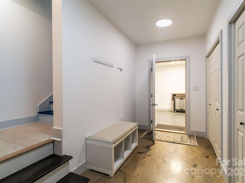 22 Lara Drive, Mills River, NC 28759.  MLS# CAR4271505, YatesRealty ID 2958. Hallway from main level to top level